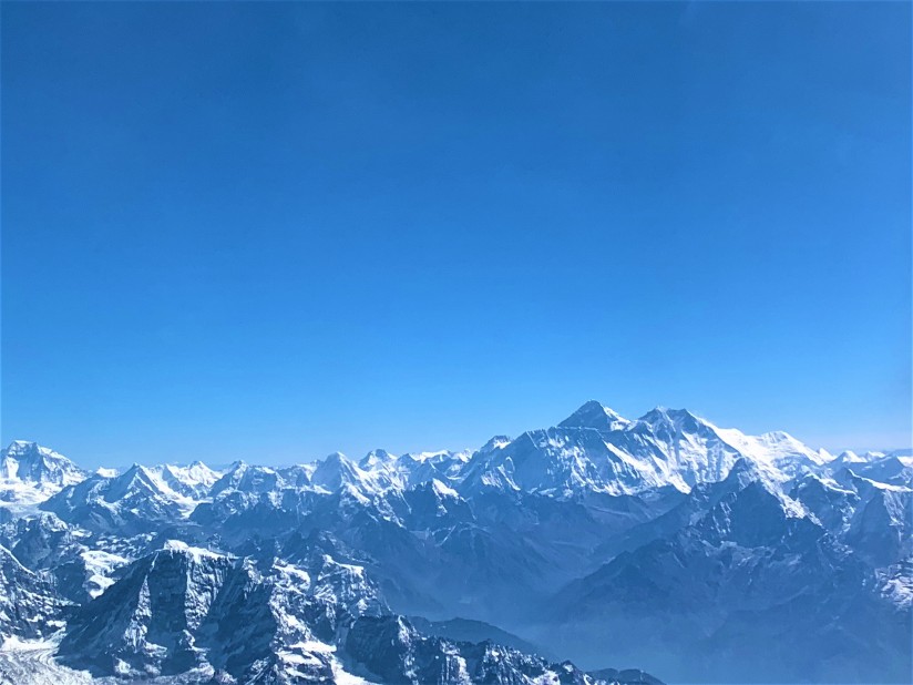 Mt Everest and the Himalalyan range while flying in a plane from 7000 ft 